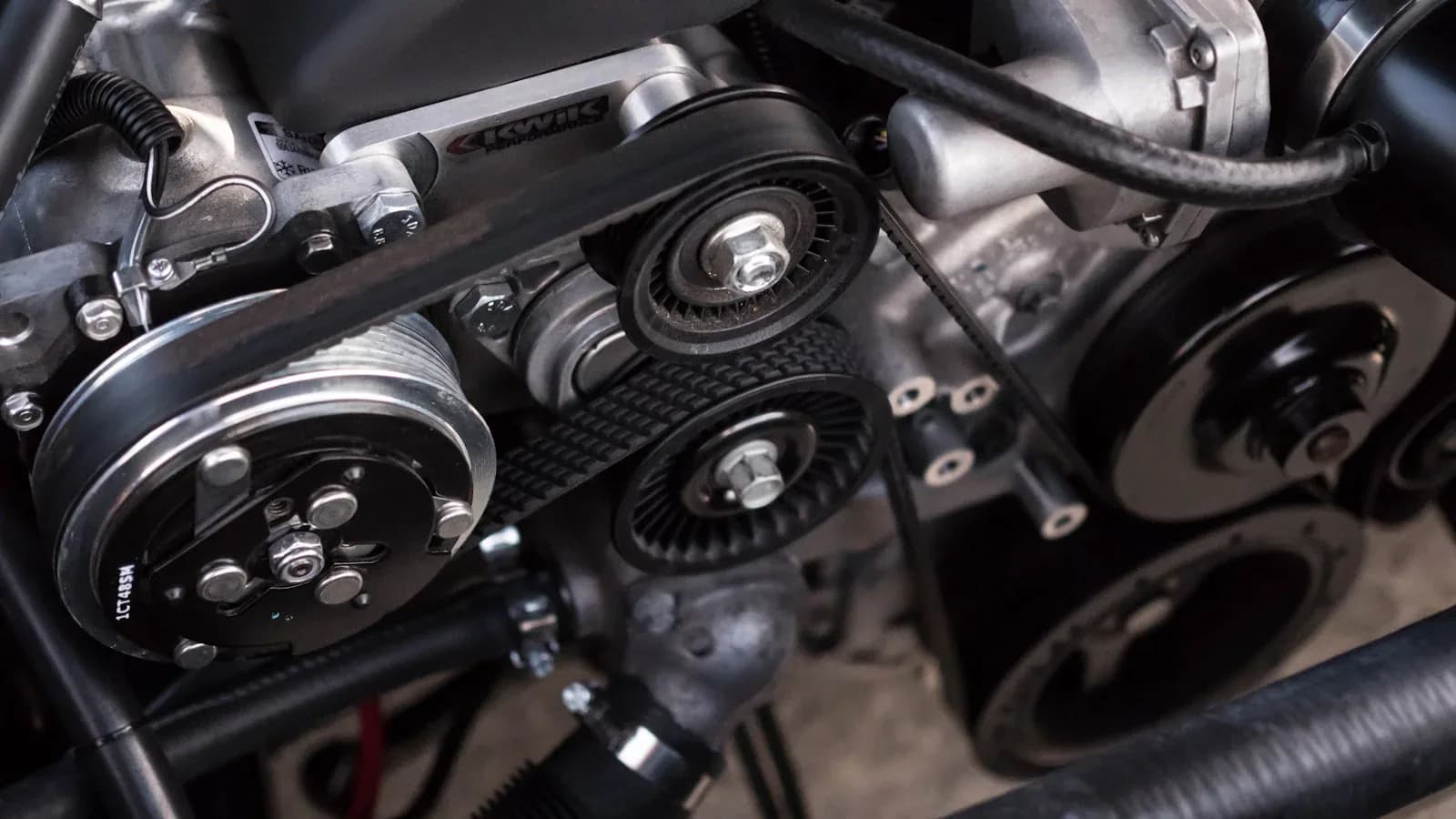 Certified mechanic working on vehicle in KL workshop
